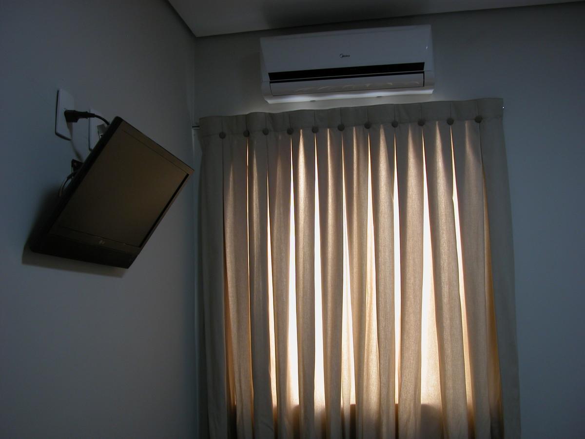 Hotel Avenida Tupa Bagian luar foto