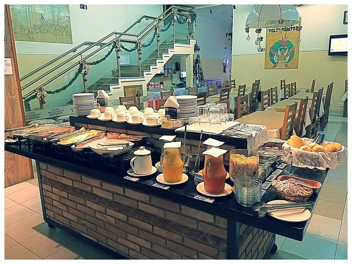 Hotel Avenida Tupa Bagian luar foto
